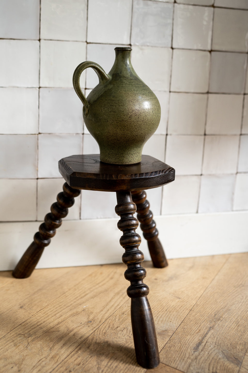 Houten driepoot krukje