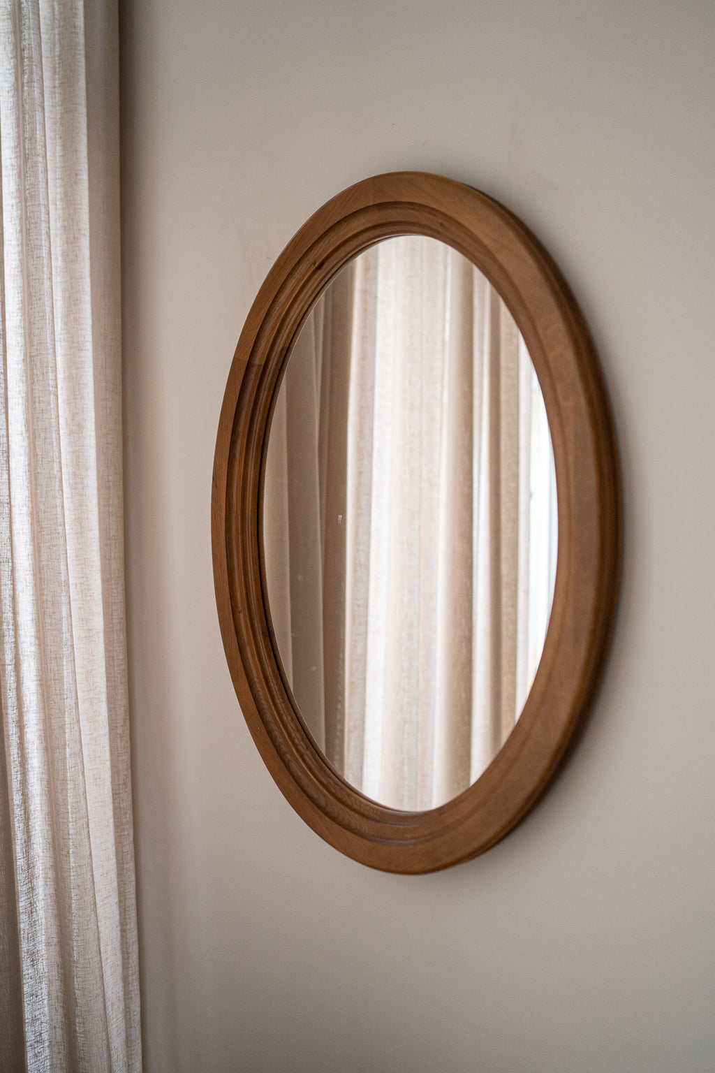 Ovale houten spiegel