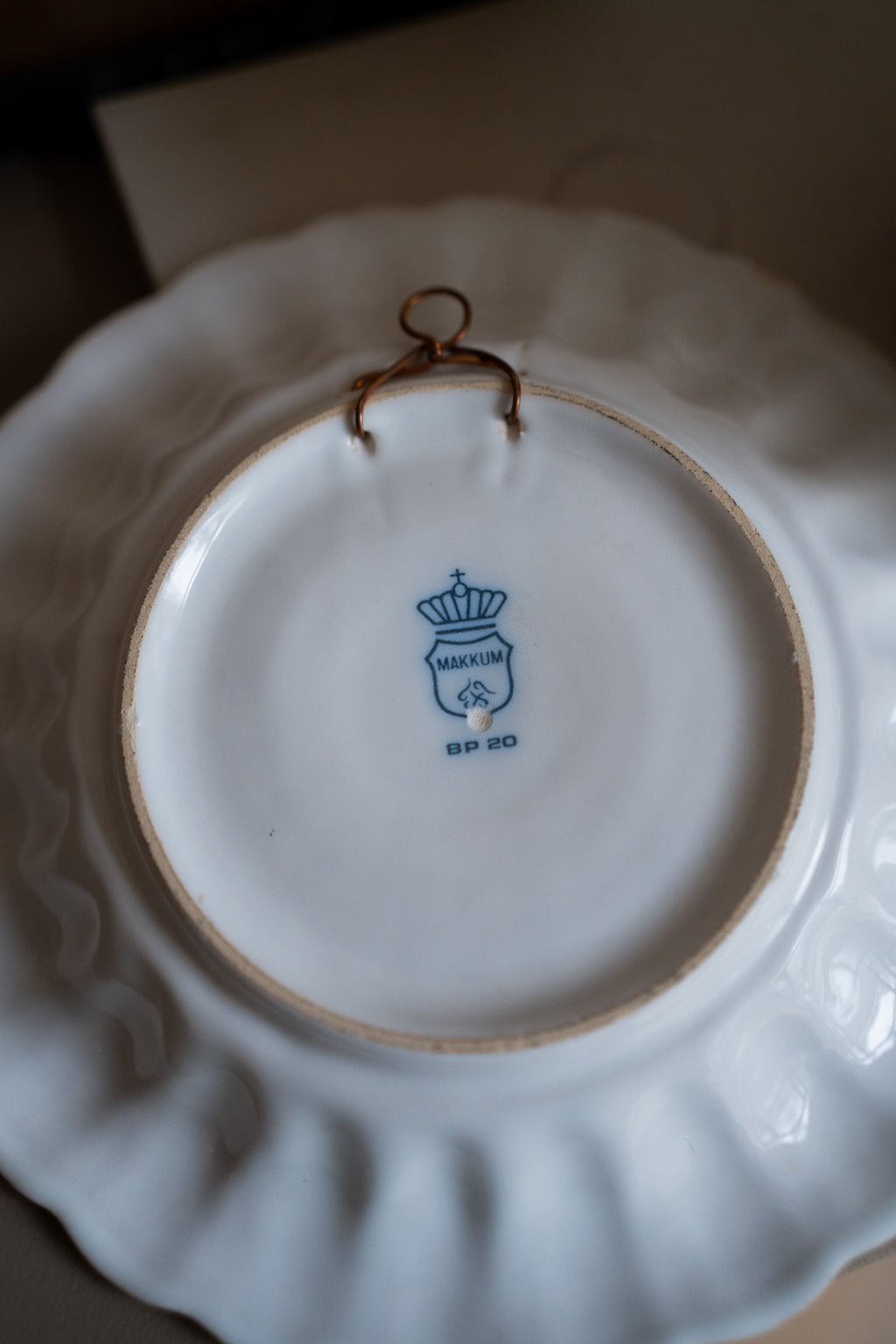 Crèmekleurige wandbord