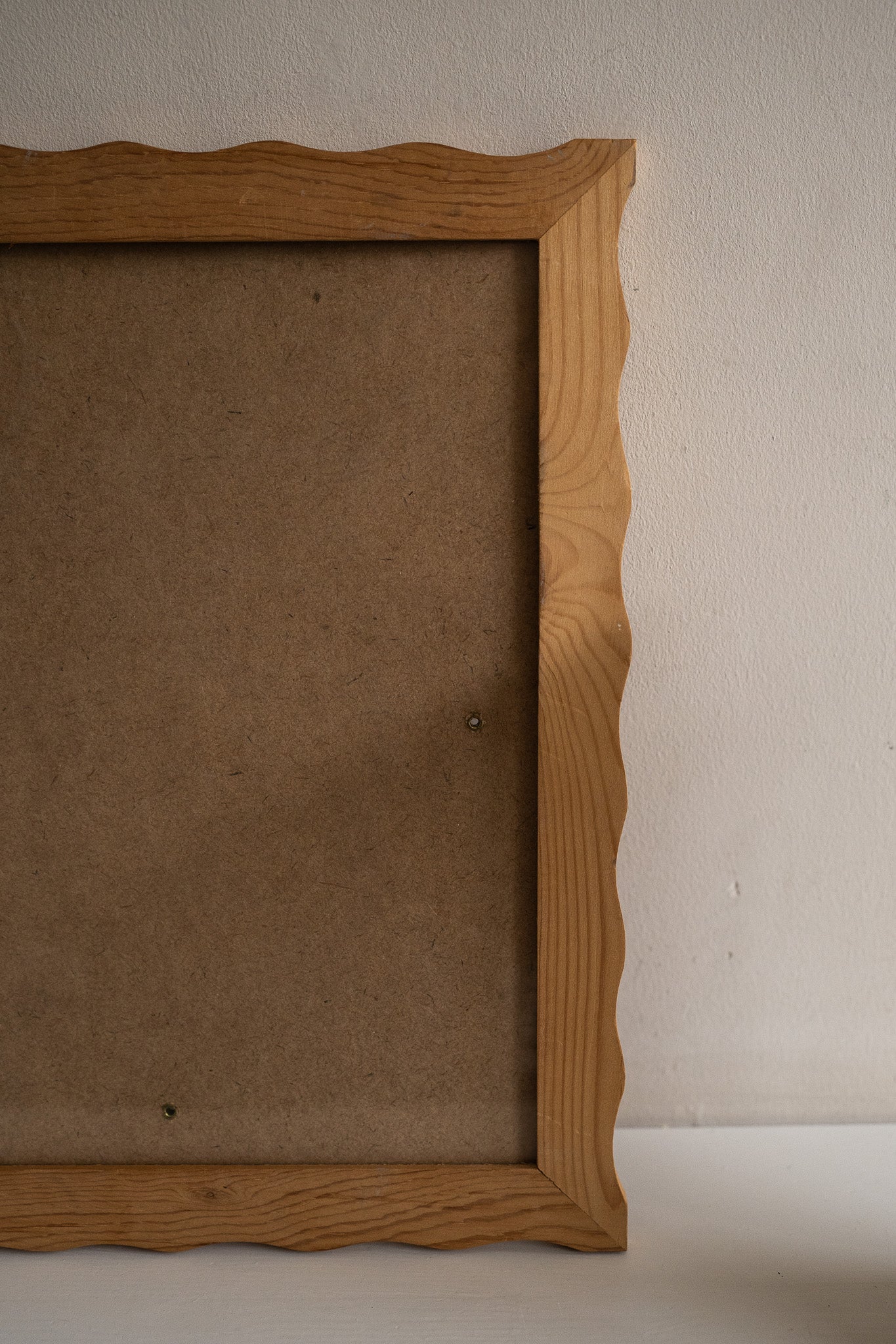 Golvende houten fotolijst