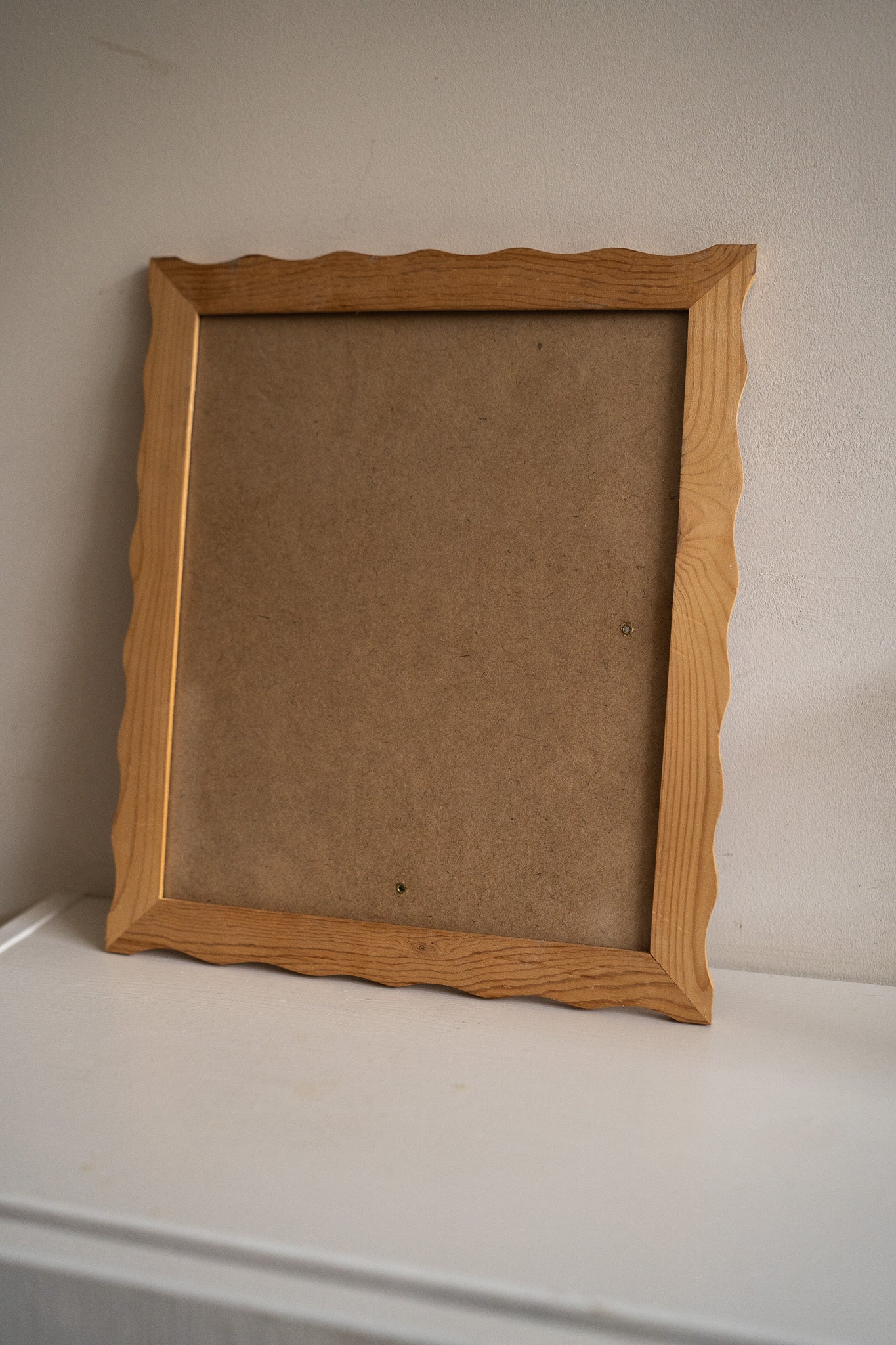 Golvende houten fotolijst