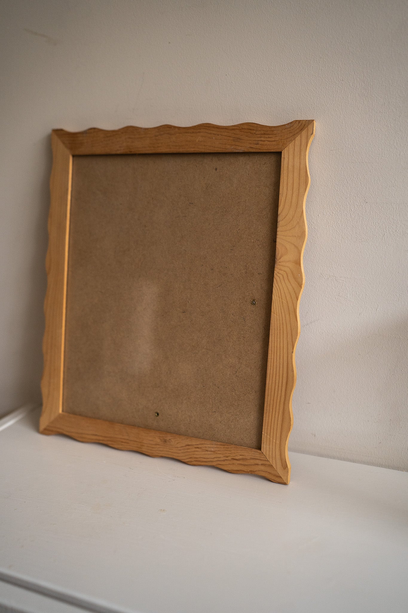 Golvende houten fotolijst