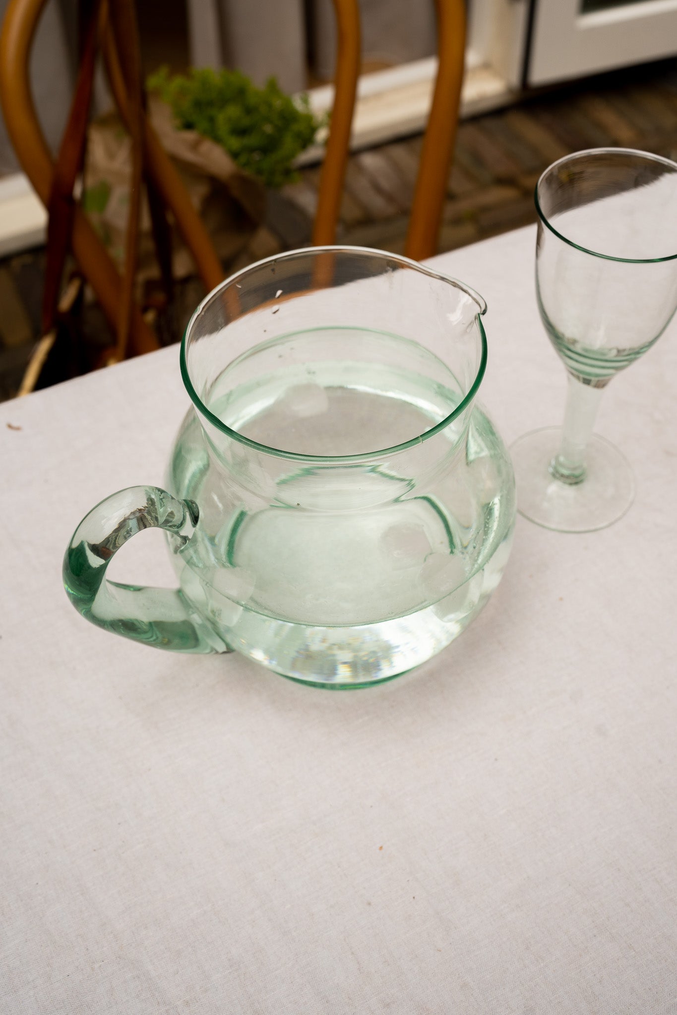 Green colored glass jug
