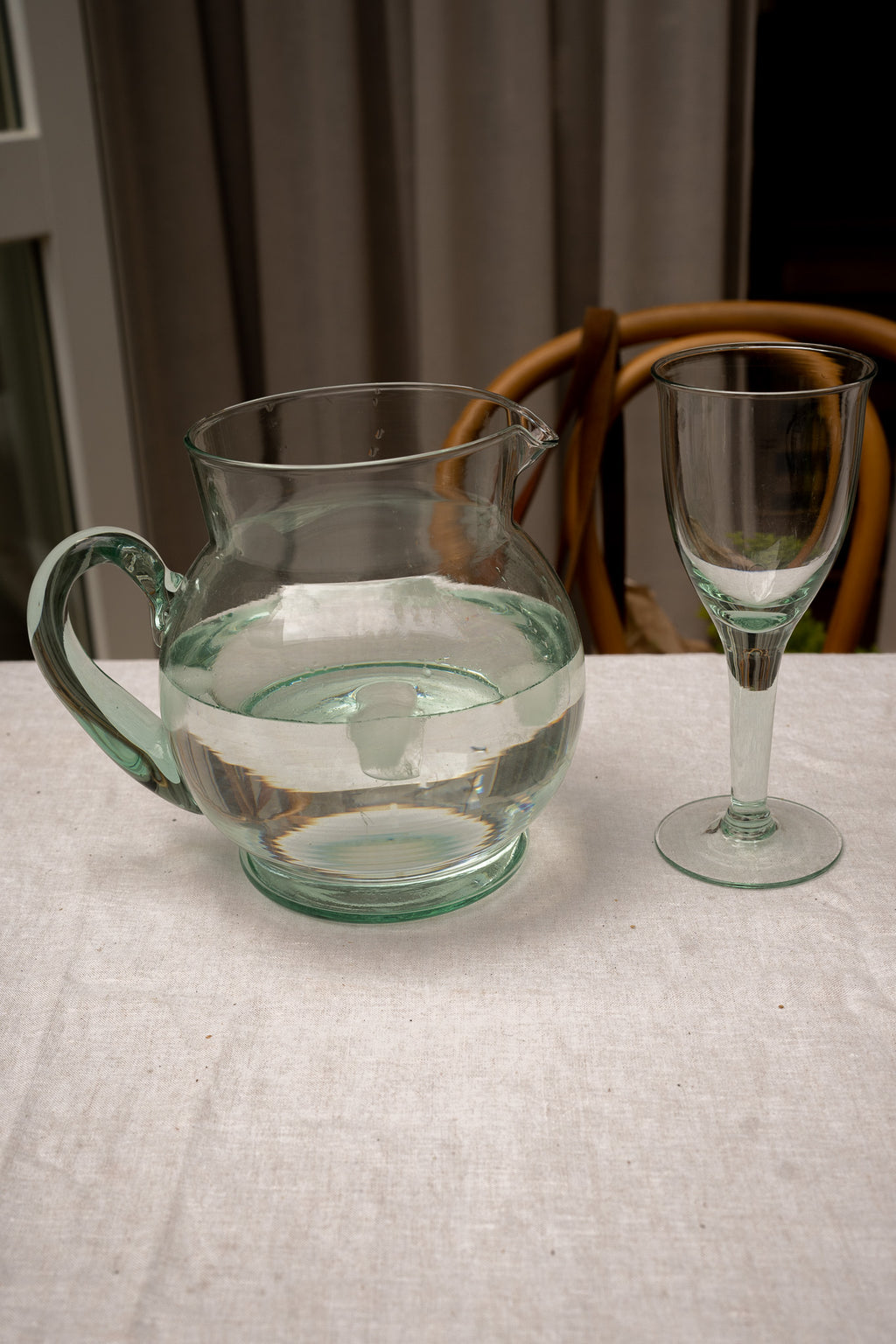 Green colored glass jug