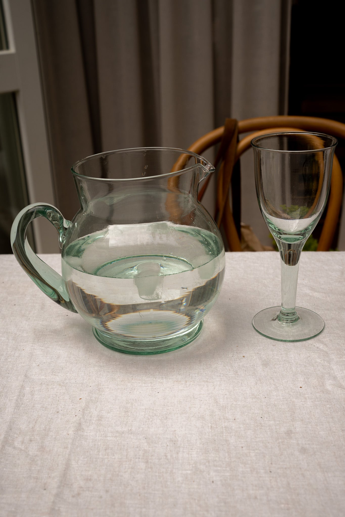 Green colored glass jug