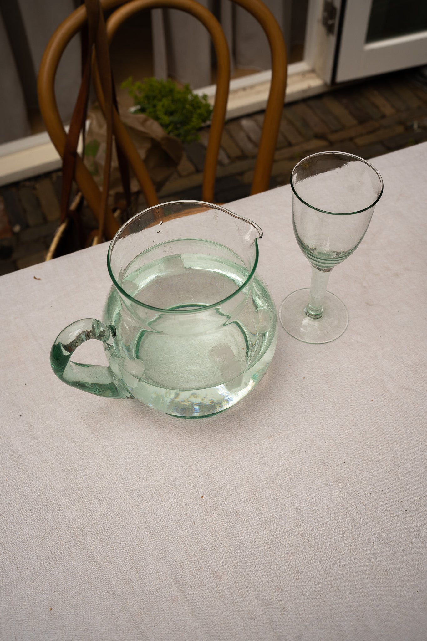 Green colored glass jug