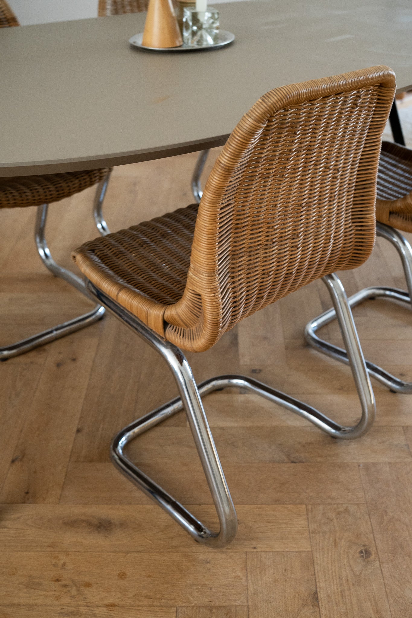 Set of 4 rattan chairs with chrome base