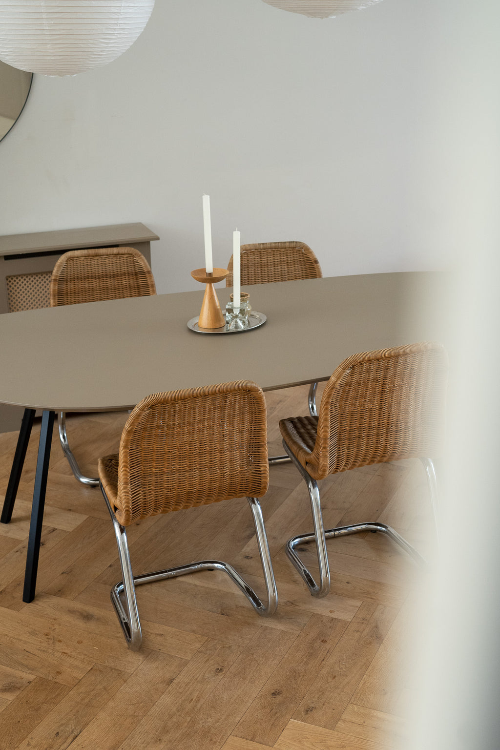 Set of 4 rattan chairs with chrome base