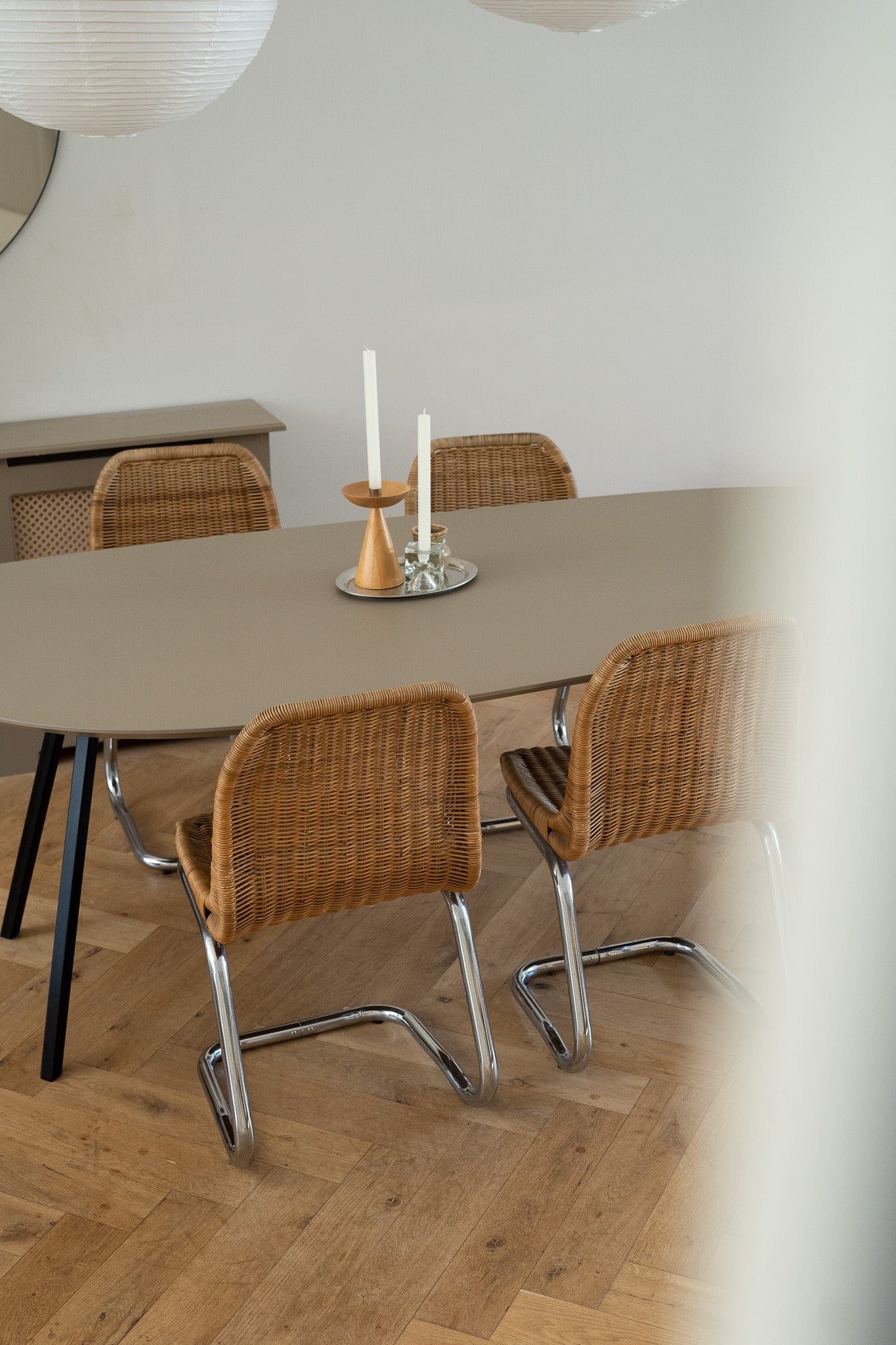 Set of 4 rattan chairs with chrome base