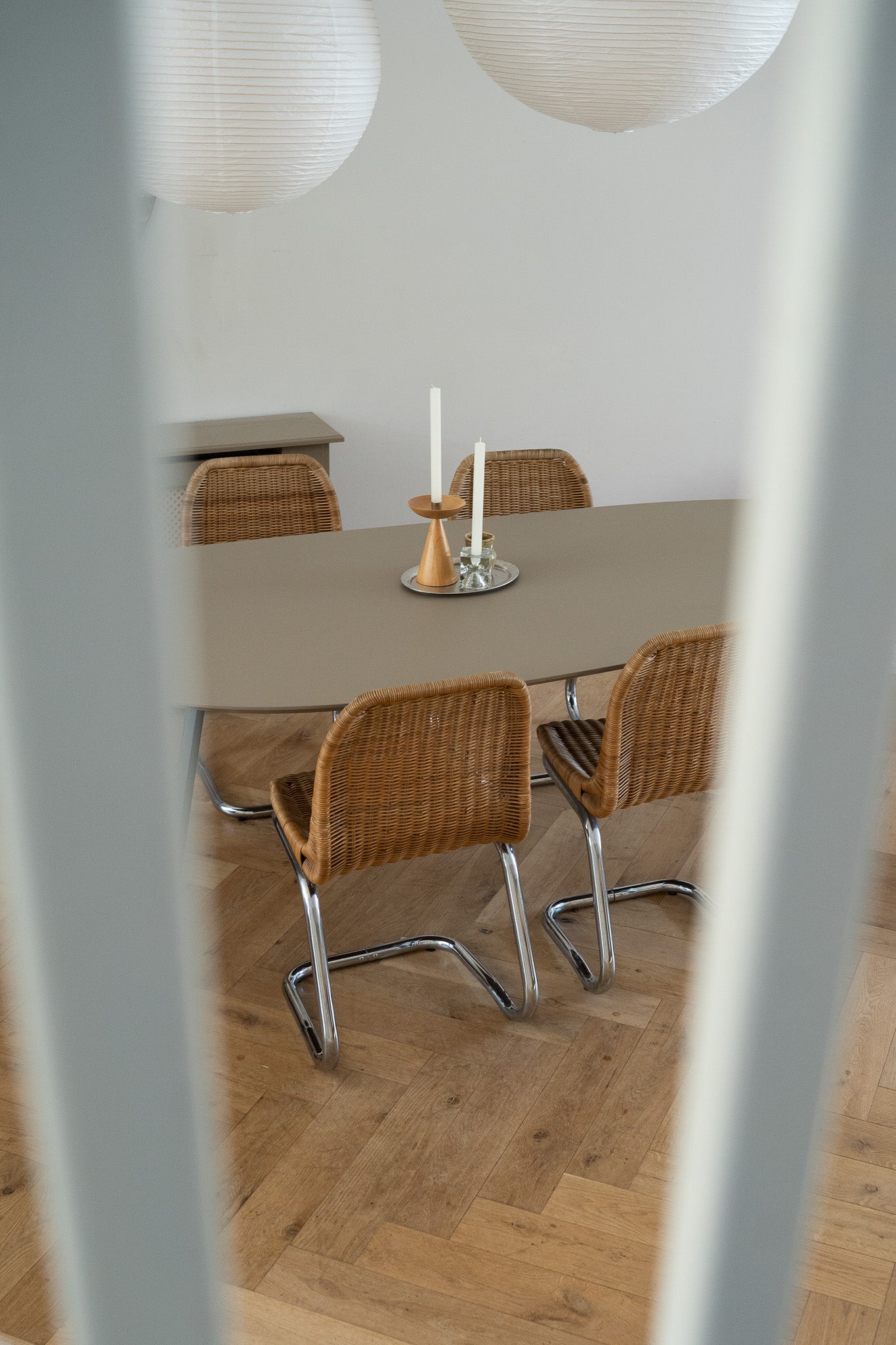 Set of 4 rattan chairs with chrome base