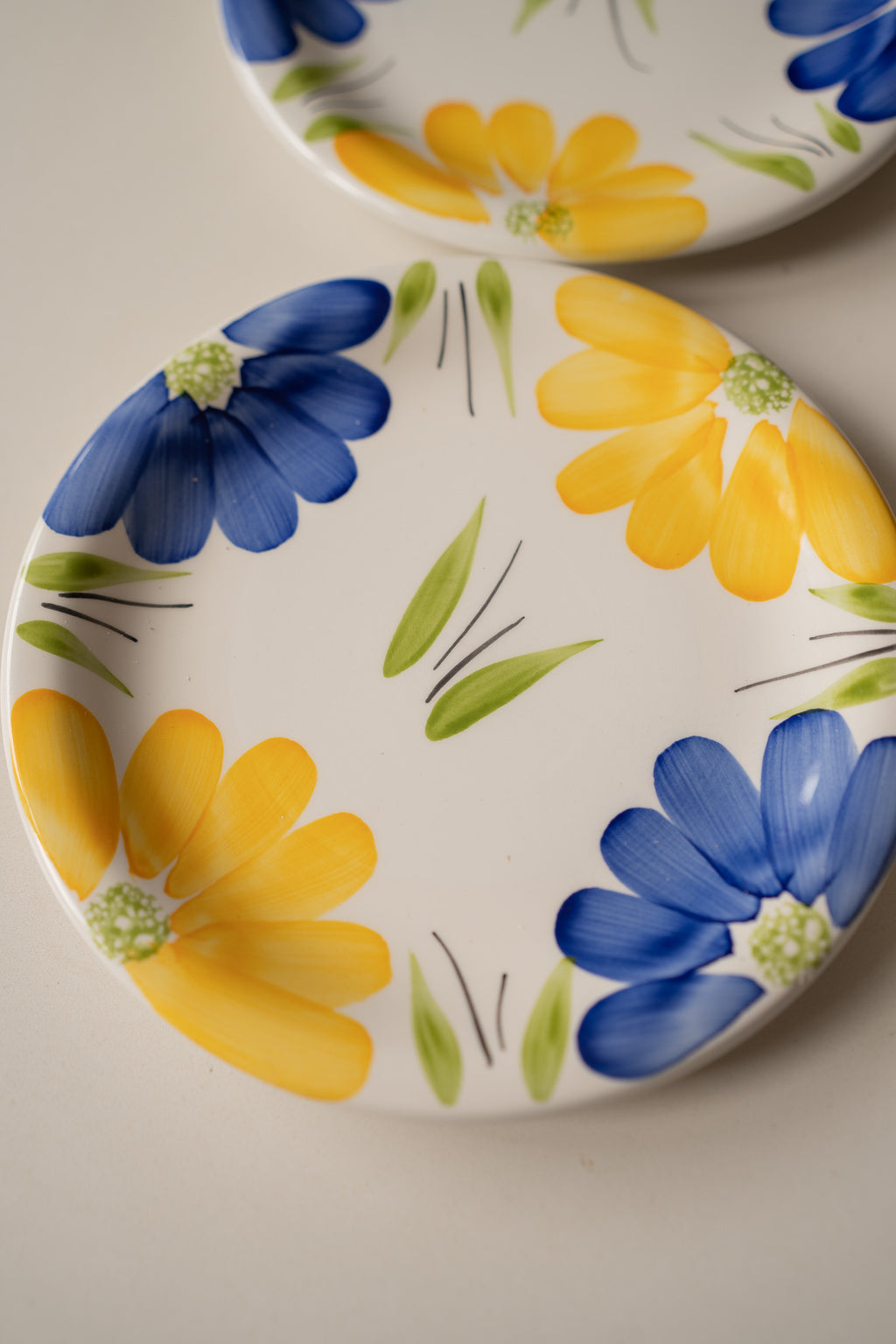 Set van 4 gebloemde bordjes