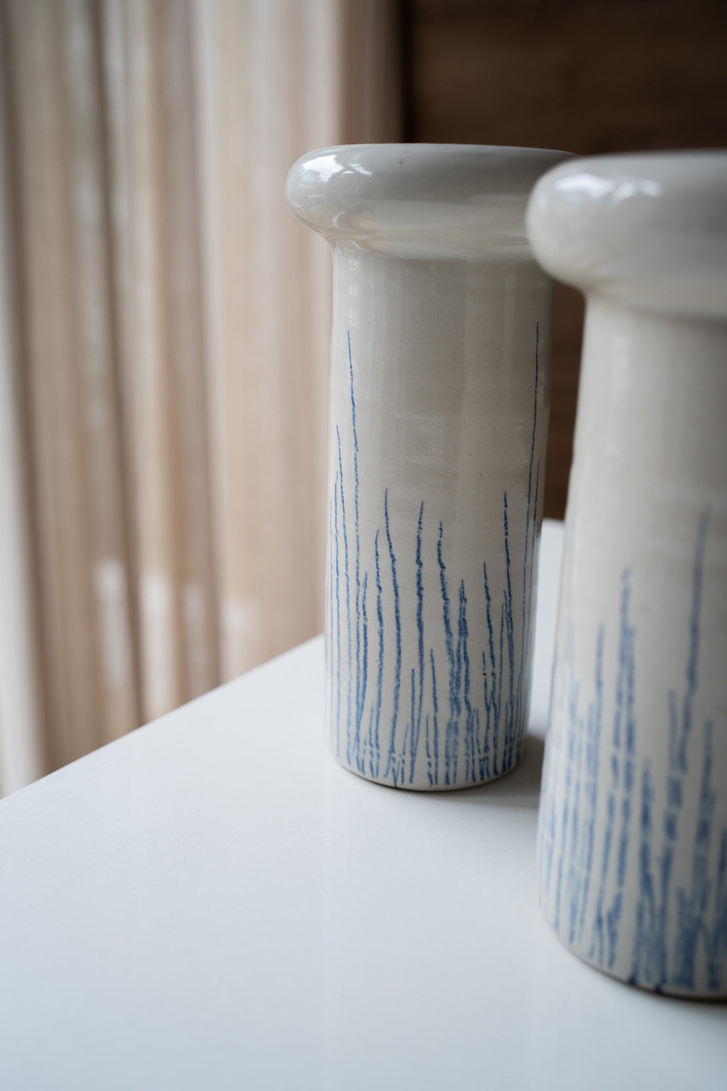 Crèmekleurige vaas met strepen