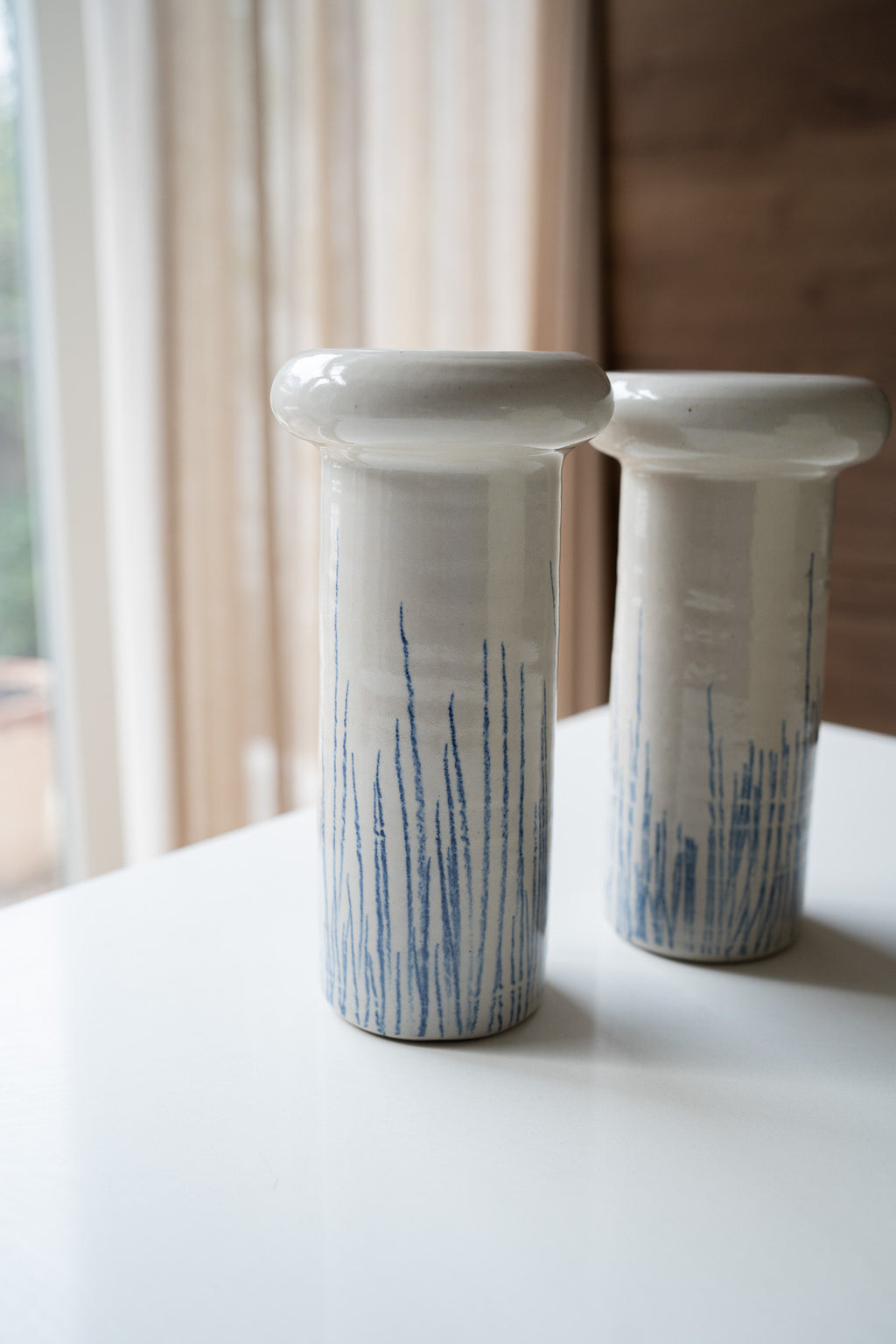 Crèmekleurige vaas met strepen