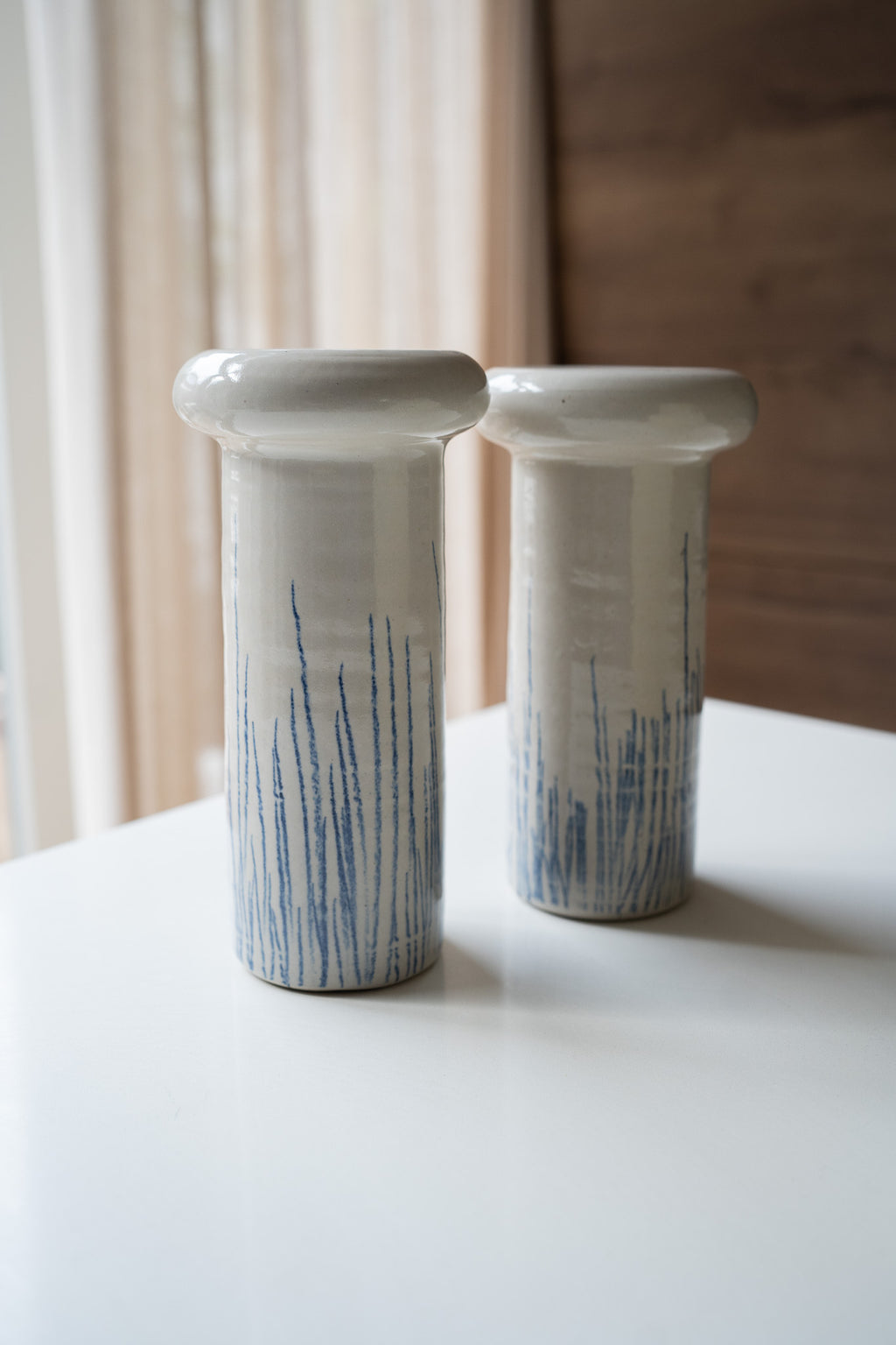 Crèmekleurige vaas met strepen